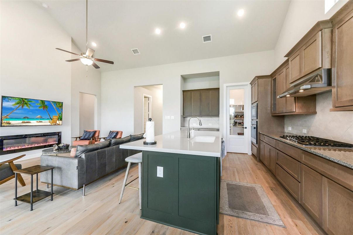 Fireplace, Interior, Kitchen, Living room, Recessed Lighting, Wood Texture Flooring