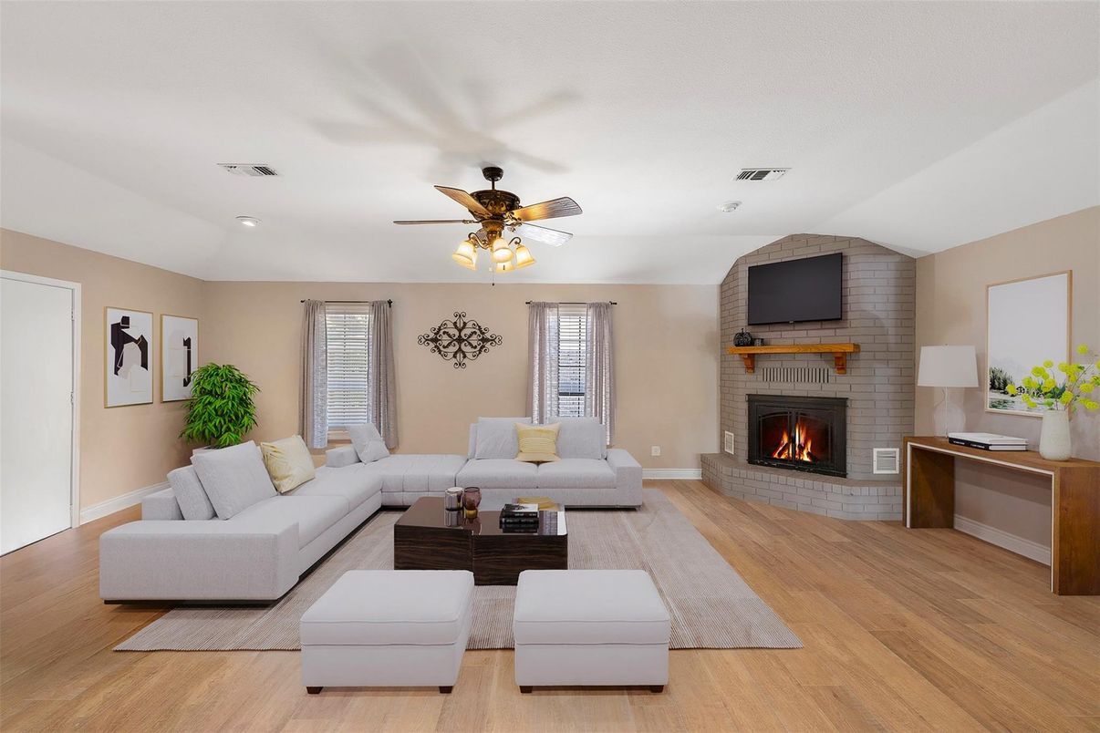 Fireplace, Interior, Living room, Recessed Lighting, Stone Walls, Wood Texture Flooring