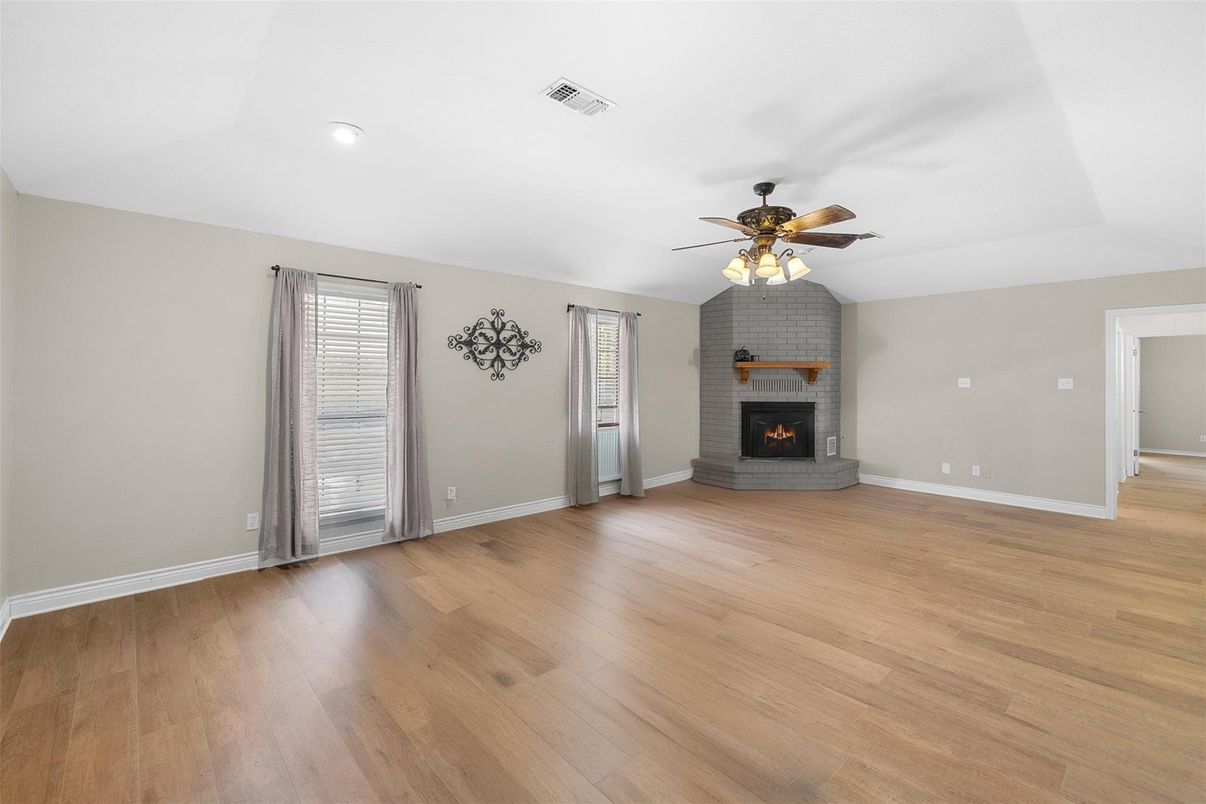 Empty room, Fireplace, Interior, Recessed Lighting, Wood Texture Flooring