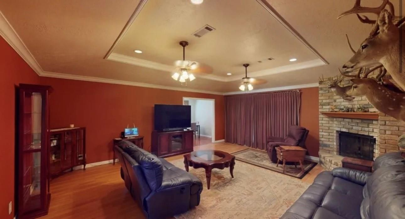 Fireplace, Interior, Living room, Pendant Lights, Recessed Lighting, Stone Walls, Wood Texture Flooring