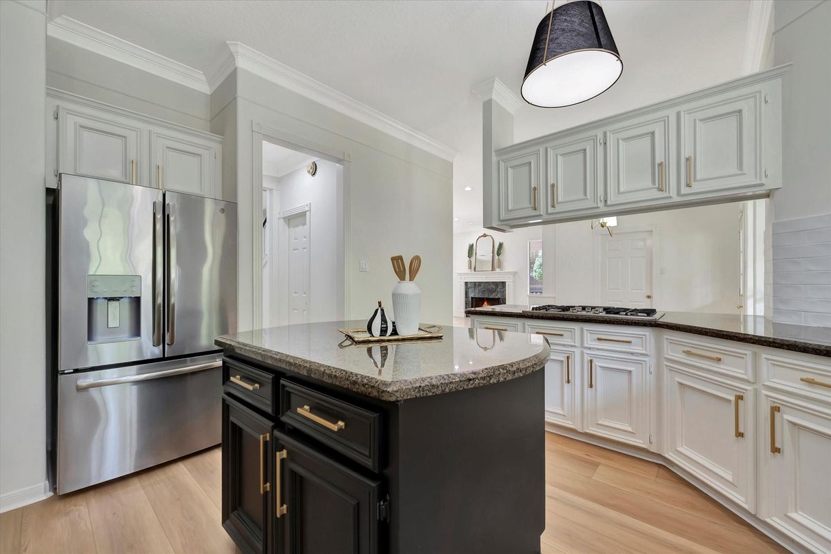 Fireplace, Interior, Kitchen, Stainless Steel Appliances, Wood Texture Flooring