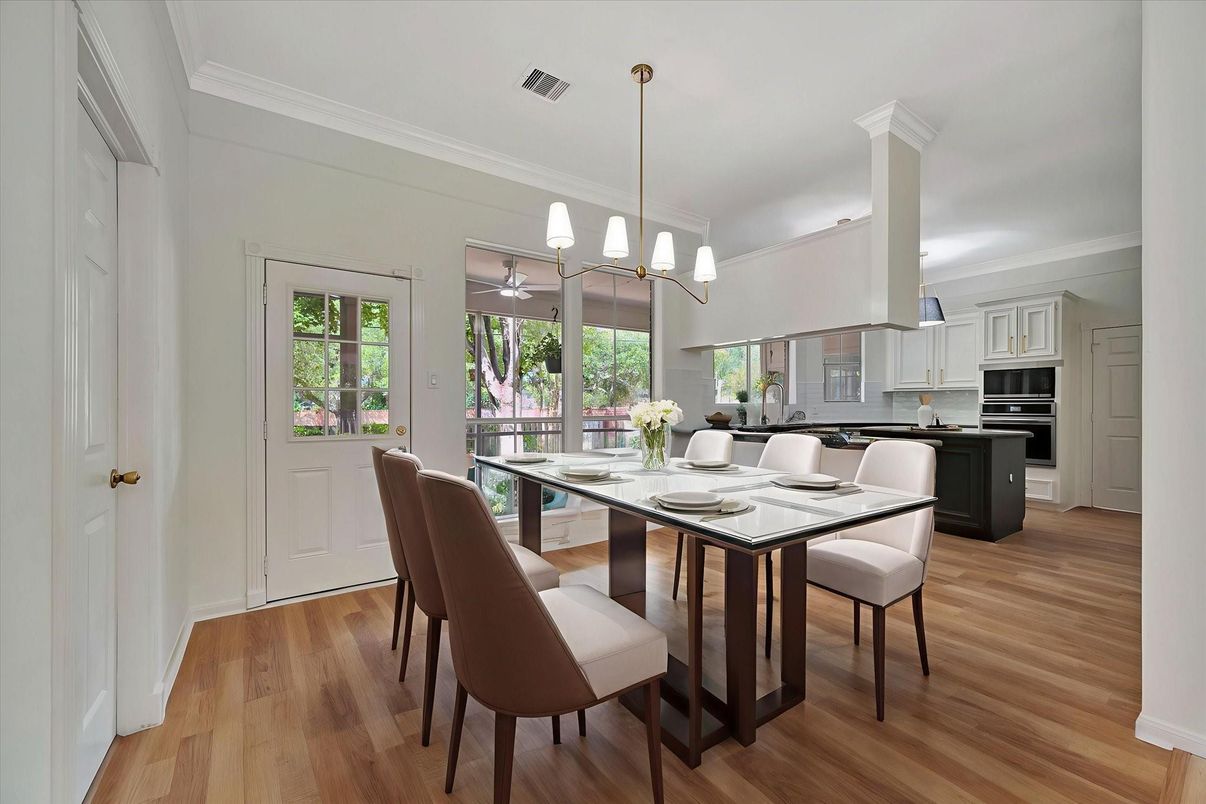 Chandelier, Dining room, Interior, Kitchen, Pendant Lights, Stainless Steel Appliances, Wood Texture Flooring