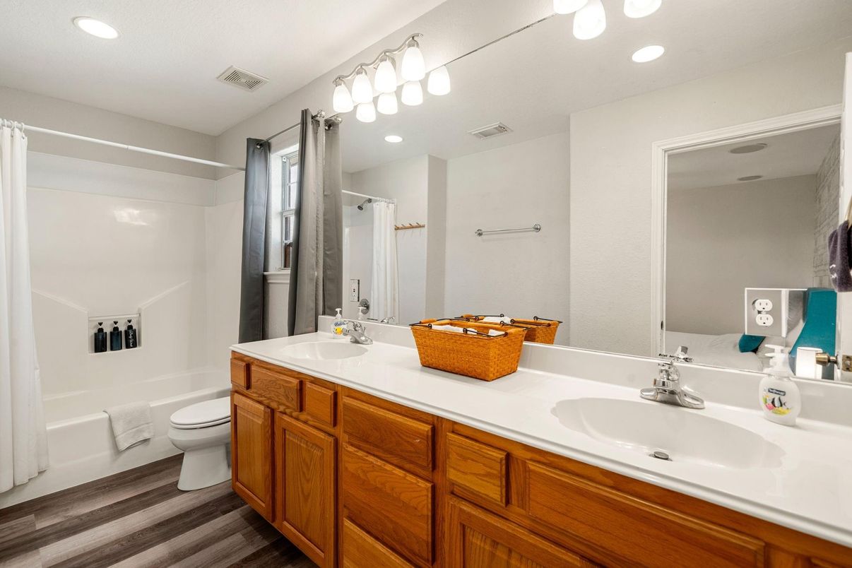 Bathroom, Dual Sink Vanities, Interior, Recessed Lighting, Wood Texture Flooring