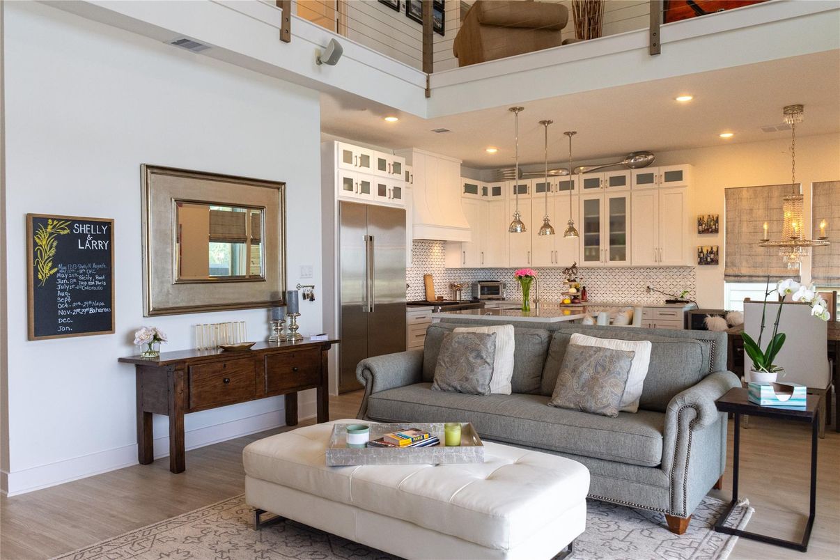 Chandelier, Interior, Kitchen, Living room, Pendant Lights, Recessed Lighting, Stainless Steel Appliances, Wood Texture Flooring