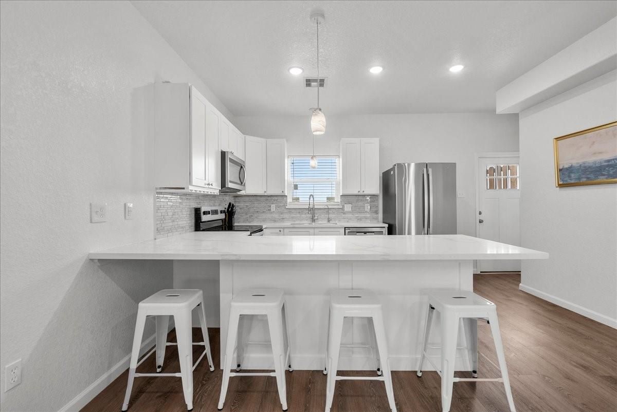 Interior, Kitchen, Pendant Lights, Recessed Lighting, Stainless Steel Appliances, Wood Texture Flooring