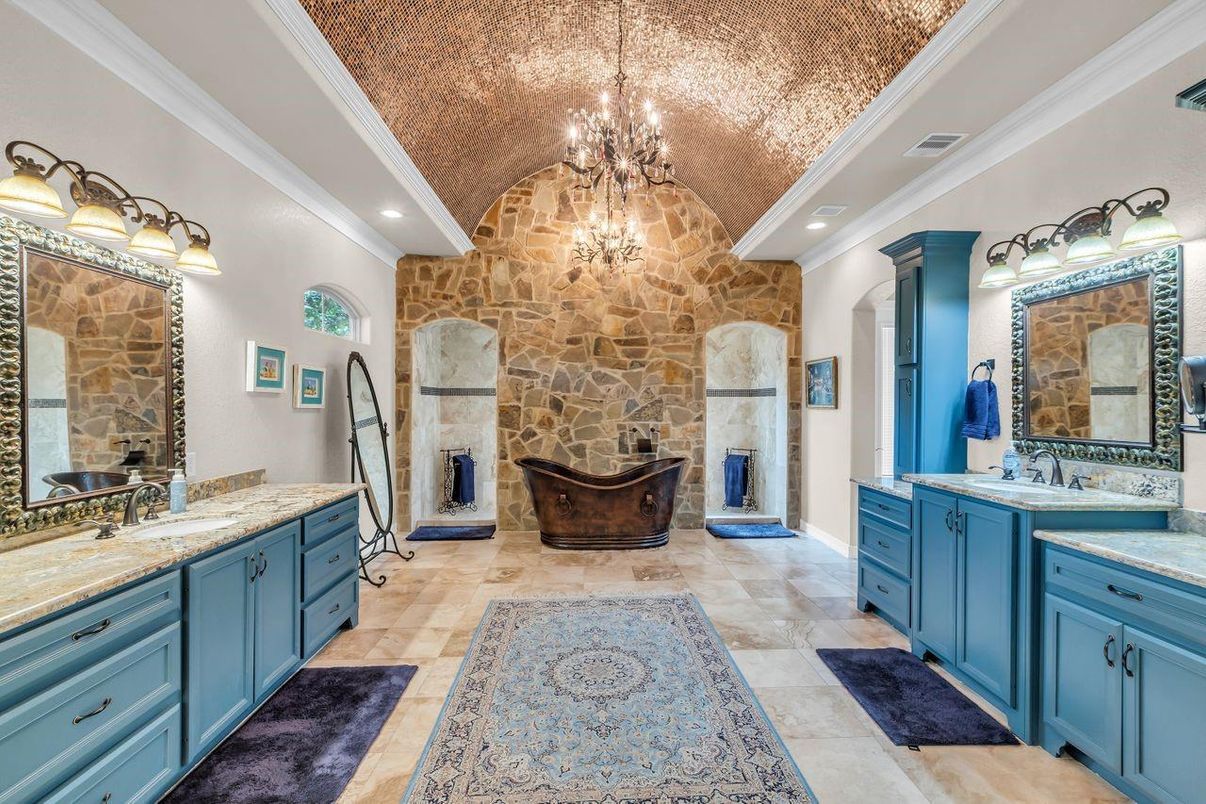 Bathroom, Chandelier, Dual Sink Vanities, Fireplace, Interior, Recessed Lighting, Stone Walls