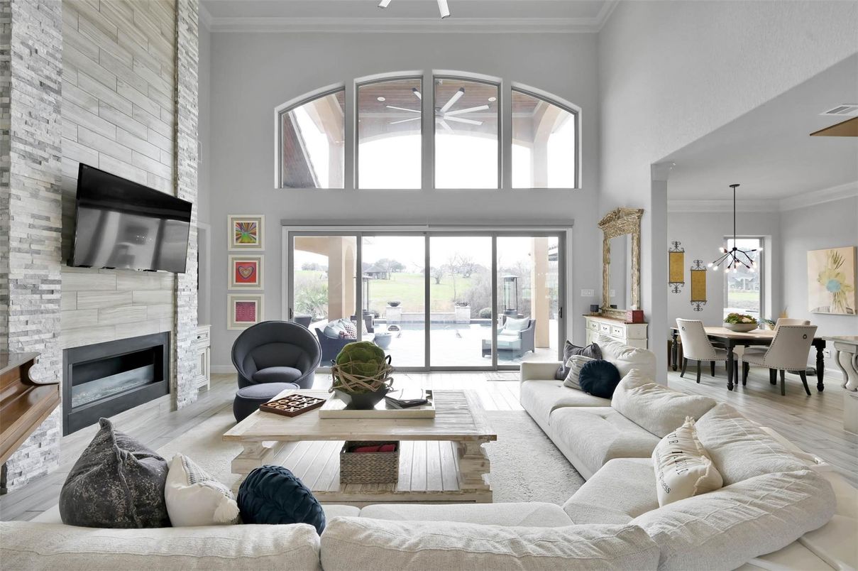 Dining room, Fireplace, Interior, Living room, Pendant Lights, Stone Walls, Wood Texture Flooring