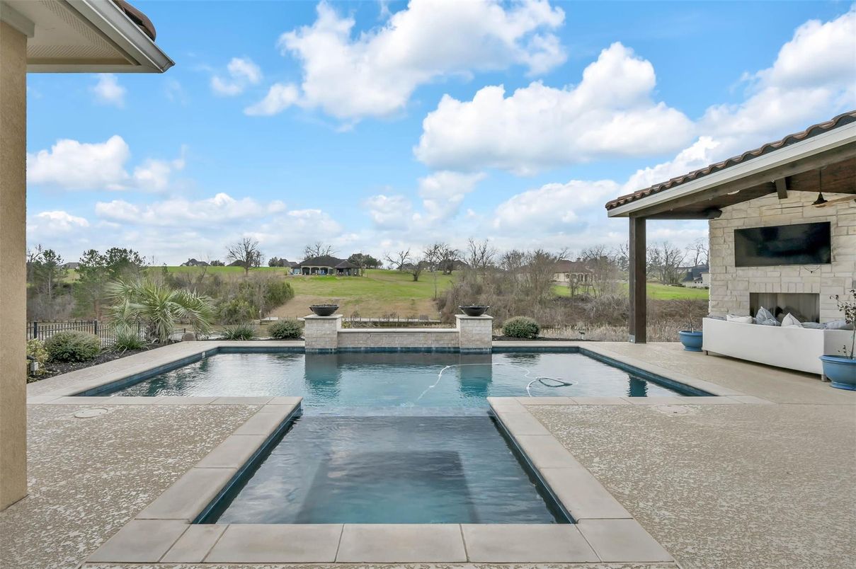 Exterior, Fireplace, Pool