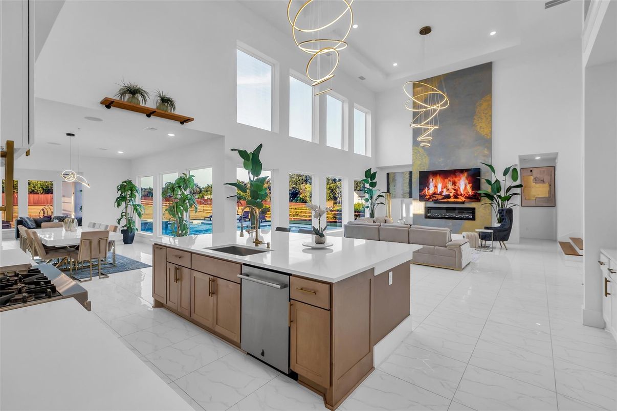 Dining room, Fireplace, Interior, Kitchen, Living room, Marble, Pendant Lights, Recessed Lighting, Stainless Steel Appliances