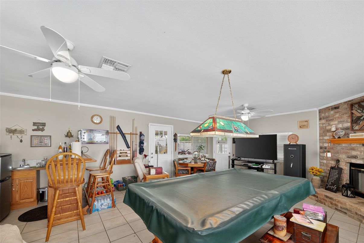 Billiard Table, Dining room, Fireplace, Interior, Pendant Lights, Stone Walls