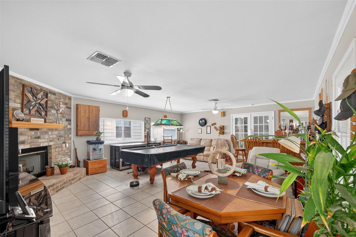 Billiard Table, Dining room, Fireplace, Game Room, Interior, Pendant Lights, Piano, Stone Walls