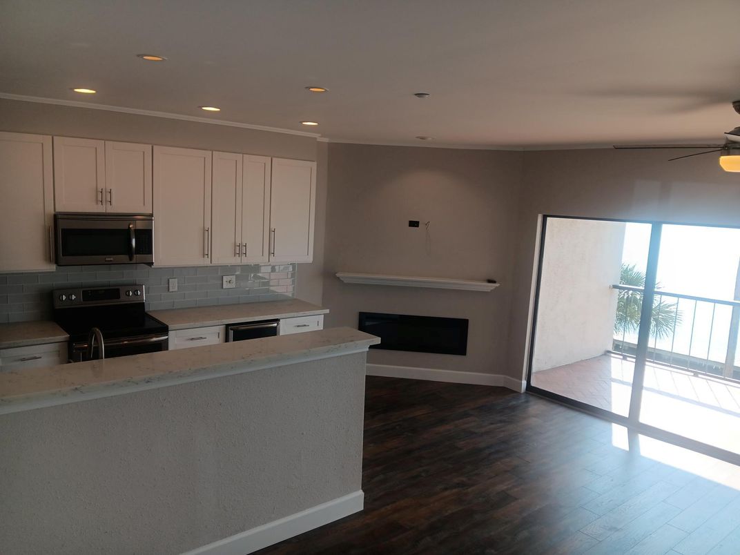 Fireplace, Interior, Kitchen, Recessed Lighting, Wood Texture Flooring