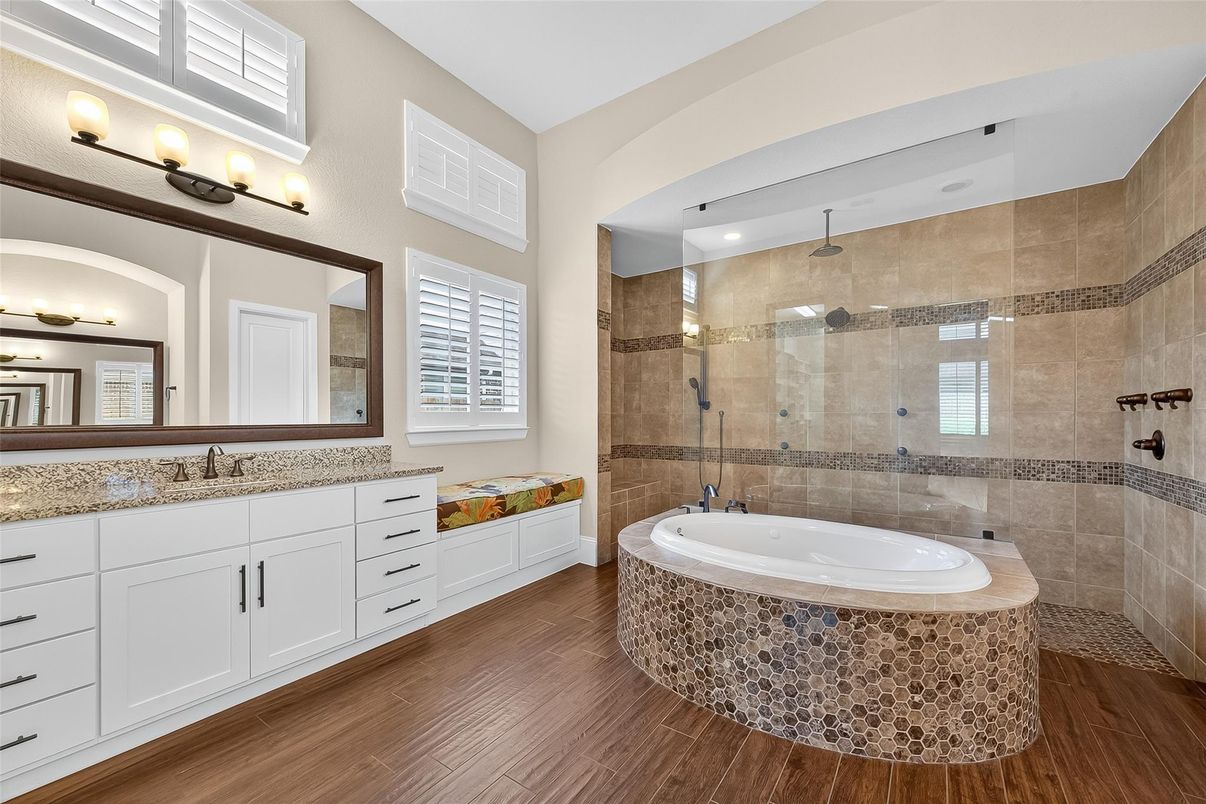 Bathroom, Dual Sink Vanities, Glass Shower, Interior, Recessed Lighting, Wood Texture Flooring