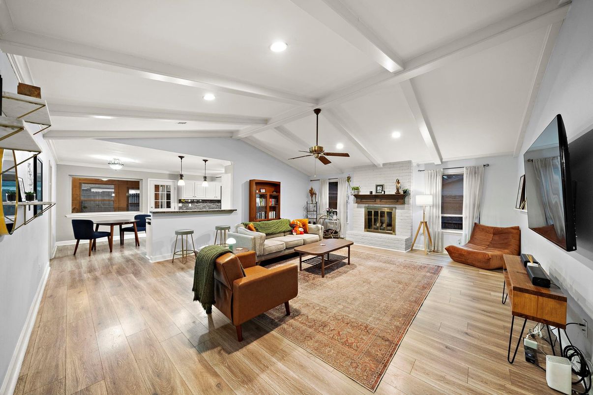 Billiard Table, Fireplace, Interior, Living room, Pendant Lights, Recessed Lighting, Stone Walls, Wood Texture Flooring