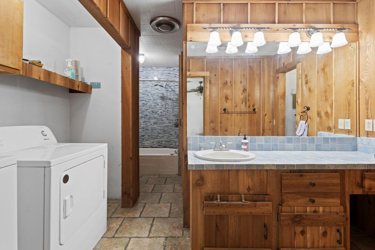 Bathroom, Interior, Tile Countertops, Washer, Wooden Walls