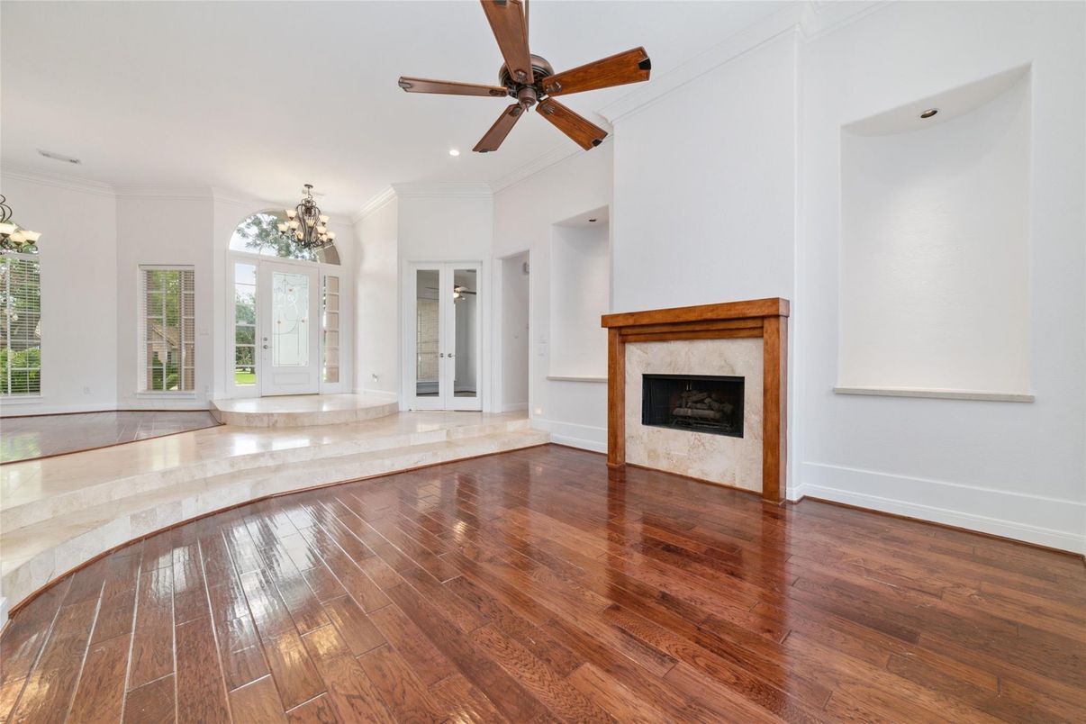 Chandelier, Empty room, Fireplace, Interior, Recessed Lighting, Wood Texture Flooring