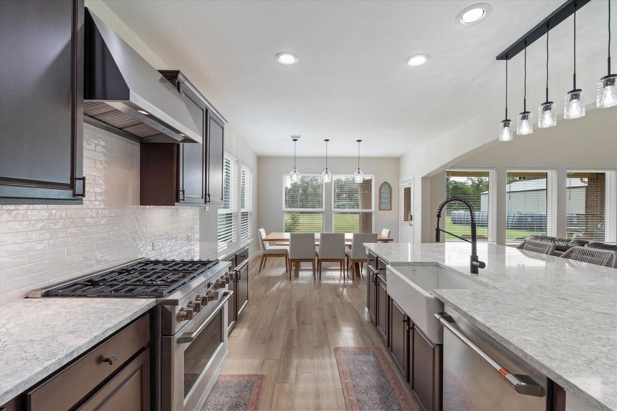 Dining room, Interior, Kitchen, Pendant Lights, Recessed Lighting, Stainless Steel Appliances, Wood Texture Flooring