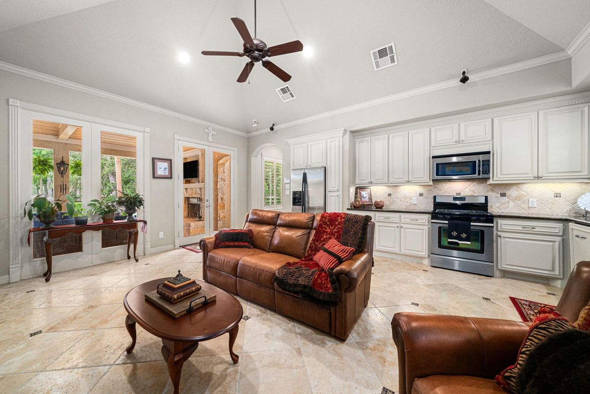 Fireplace, Interior, Kitchen, Living room, Recessed Lighting, Stainless Steel Appliances
