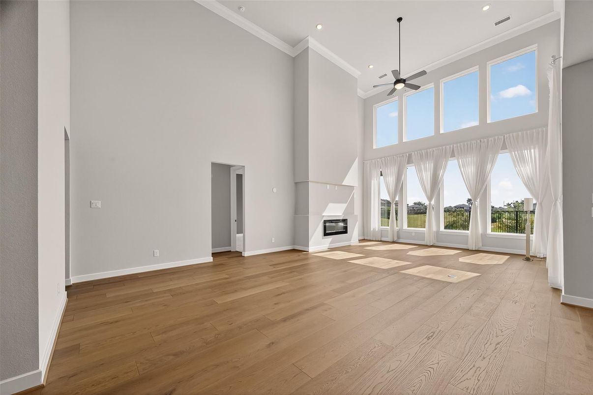 Empty room, Fireplace, Interior, Recessed Lighting, Wood Texture Flooring