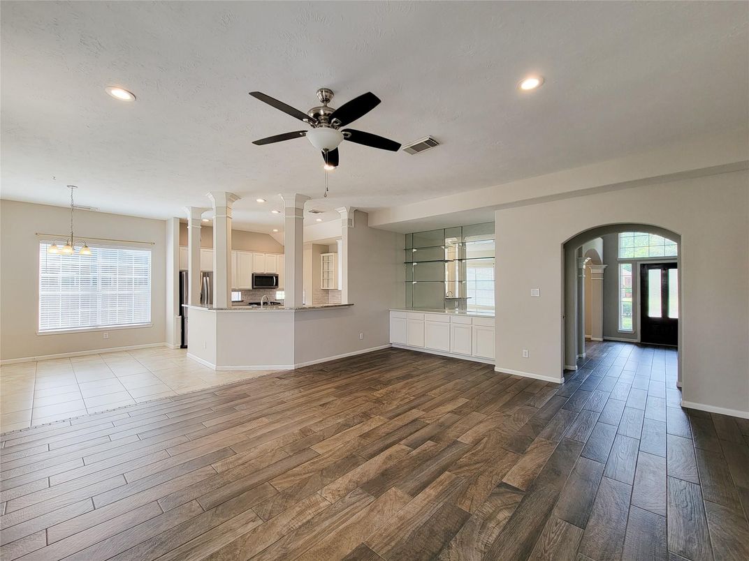 Empty room, Interior, Kitchen, Pendant Lights, Recessed Lighting, Wood Texture Flooring