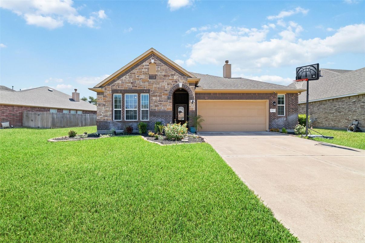 Attached, Exterior, Facade, Brick Facade, Brick Traditional