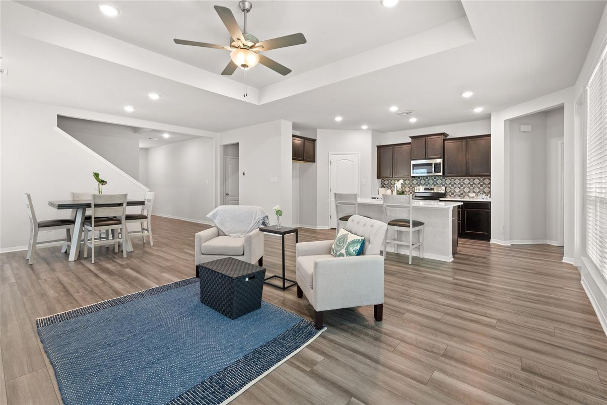 Dining room, Interior, Kitchen, Living room, Recessed Lighting, Stainless Steel Appliances, Wood Texture Flooring
