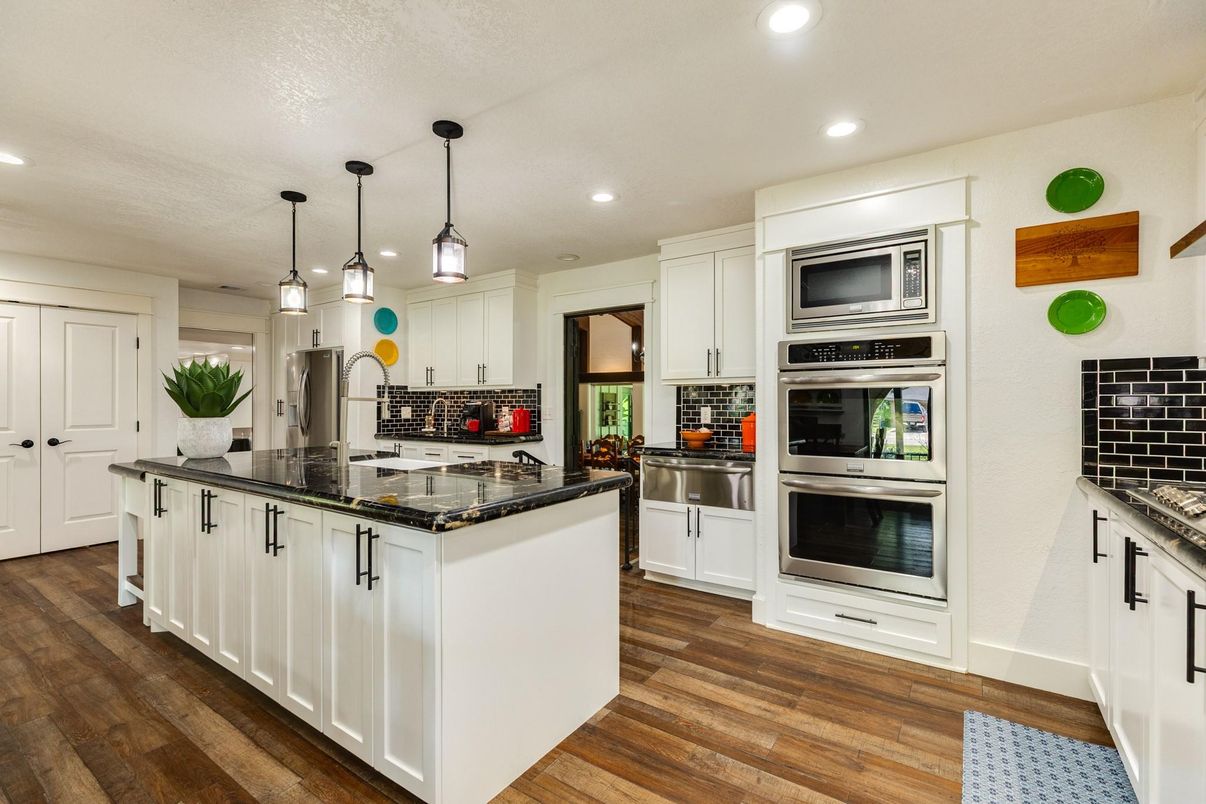 Interior, Kitchen, Pendant Lights, Recessed Lighting, Stainless Steel Appliances, Wood Texture Flooring