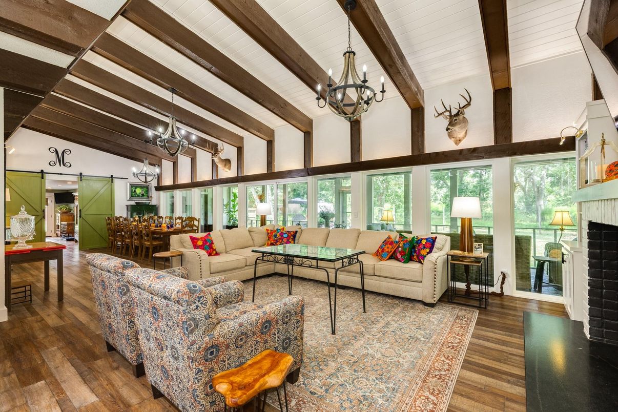 Chandelier, Dining room, Fireplace, Interior, Living room, Wooden Beams, Wood Texture Flooring
