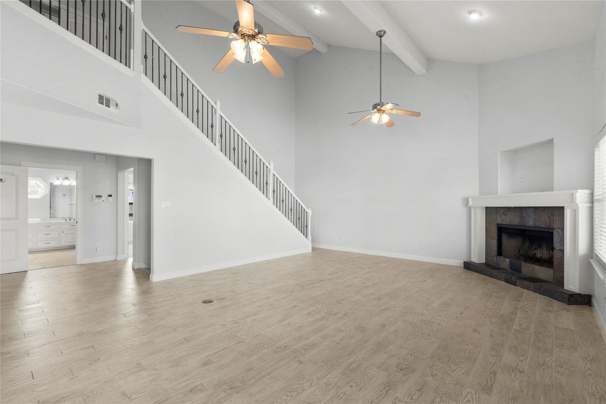 Empty room, Fireplace, Interior, Recessed Lighting, Wood Texture Flooring