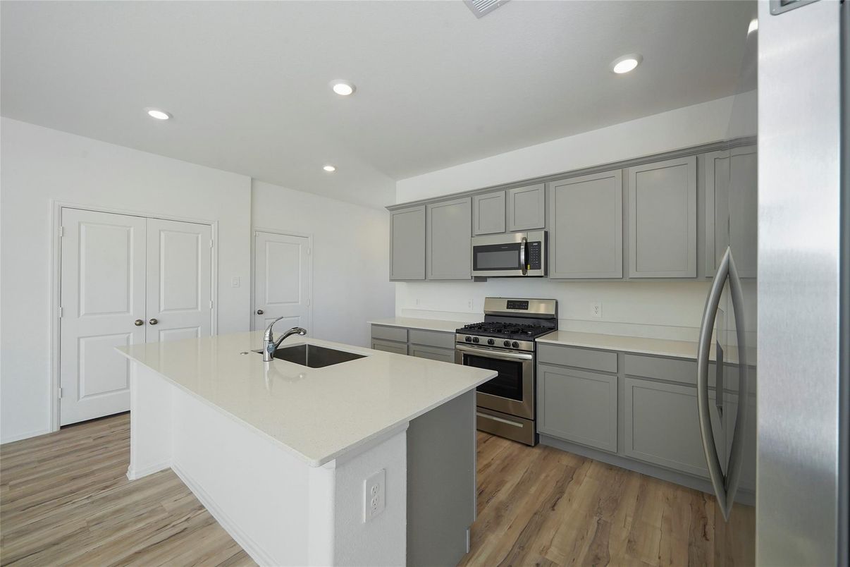 Interior, Kitchen, Recessed Lighting, Stainless Steel Appliances, Wood Texture Flooring