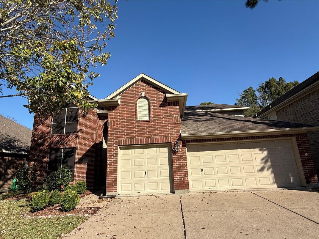 Attached, Exterior, Facade, Brick Facade, Brick Traditional