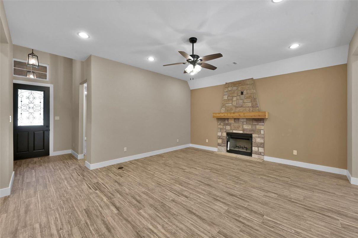 Empty room, Fireplace, Interior, Recessed Lighting, Wood Texture Flooring