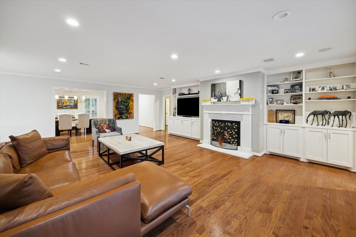 Dining room, Fireplace, Interior, Living room, Recessed Lighting, Wood Texture Flooring
