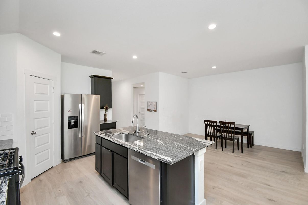 Dining room, Interior, Kitchen, Recessed Lighting, Stainless Steel Appliances, Wood Texture Flooring