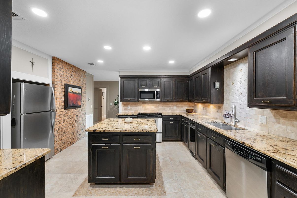 Interior, Kitchen, Recessed Lighting, Stainless Steel Appliances, Stone Walls