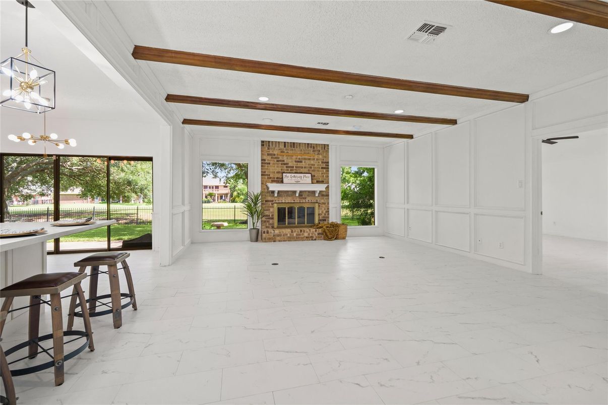 Empty room, Fireplace, Interior, Marble, Pendant Lights, Recessed Lighting, Wooden Beams
