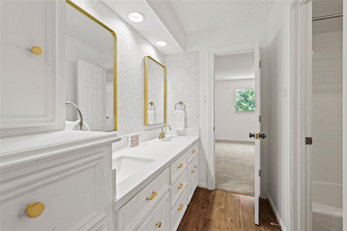 Bathroom, Dual Sink Vanities, Interior, Recessed Lighting, Wood Texture Flooring