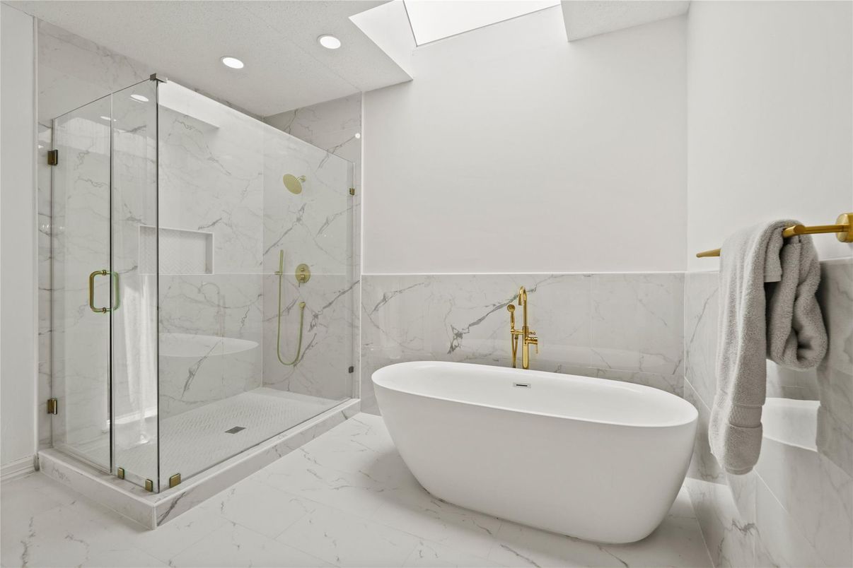 Bathroom, Free Standing Baths, Glass Shower, Interior, Marble, Marble Walls, Recessed Lighting