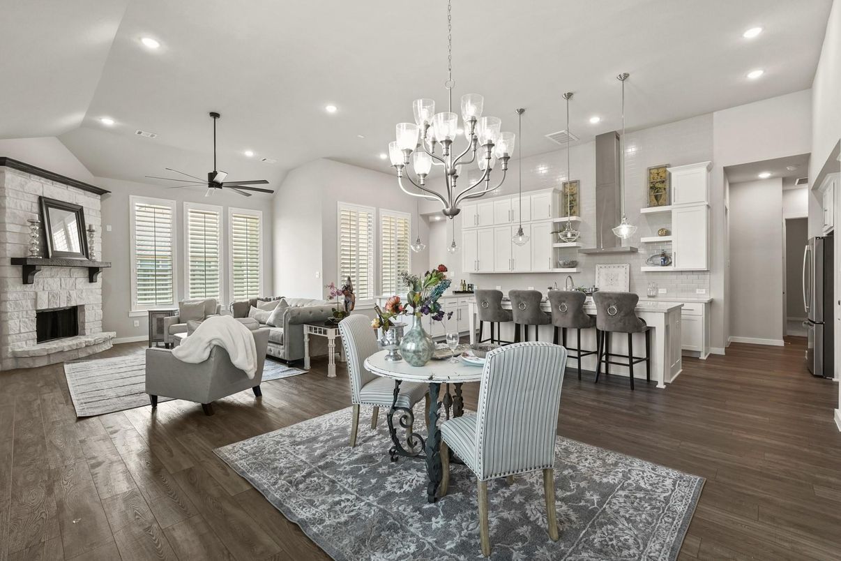 Chandelier, Dining room, Fireplace, Interior, Kitchen, Living room, Pendant Lights, Recessed Lighting, Stone Walls, Wood Texture Flooring