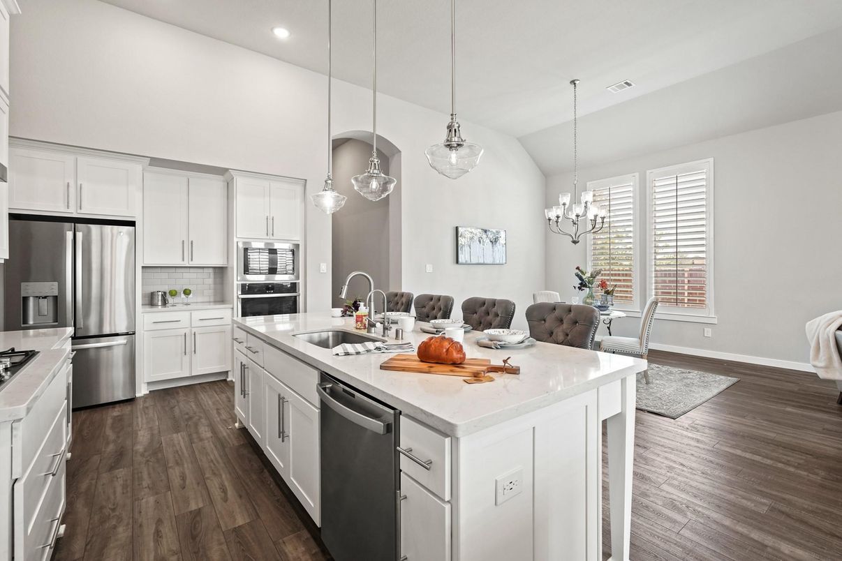 Chandelier, Dining room, Interior, Kitchen, Pendant Lights, Recessed Lighting, Stainless Steel Appliances, Wood Texture Flooring