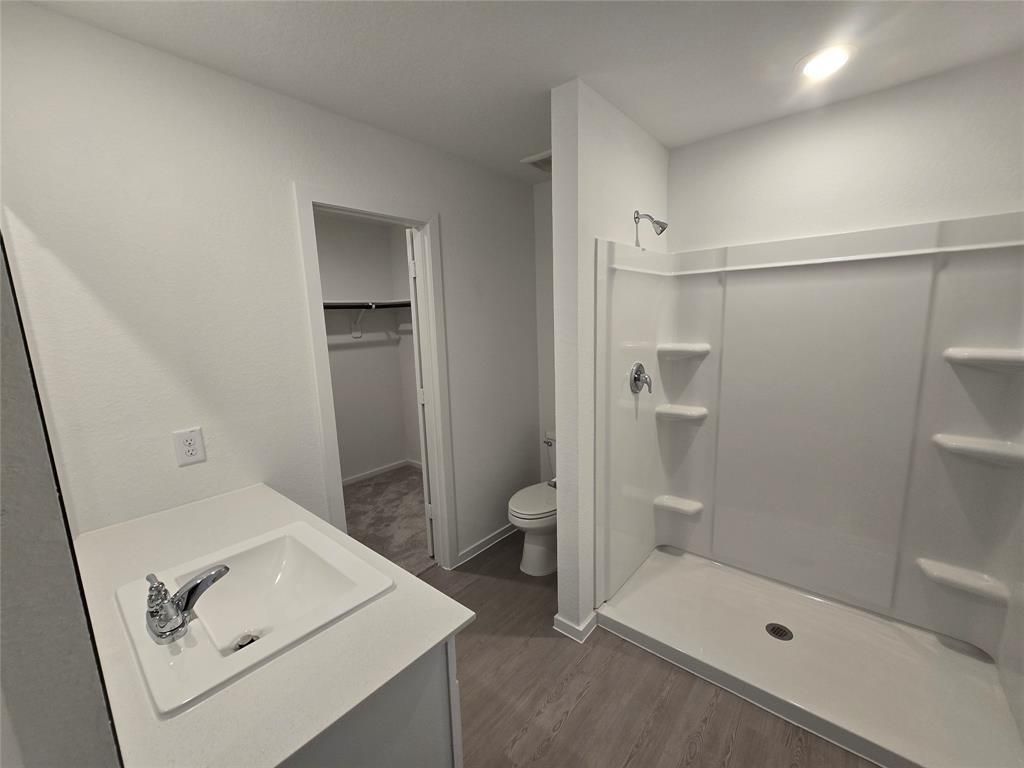 Bathroom, Interior, Recessed Lighting, Walk-in Closets, Wood Texture Flooring