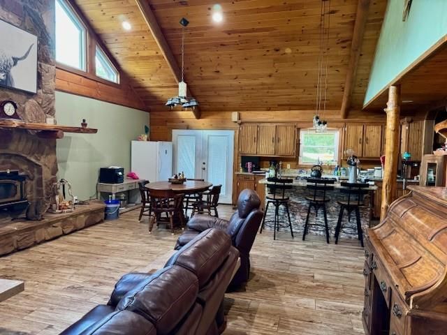 Dining room, Fireplace, Interior, Kitchen, Living room, Pendant Lights, Recessed Lighting, Wooden Beams, Wooden Ceilings, Wood Texture Flooring, Wooden Walls