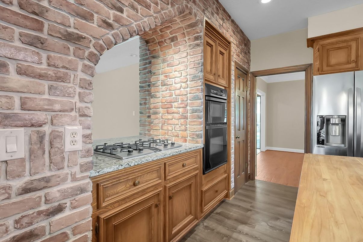 Interior, Kitchen, Recessed Lighting, Stone Walls, Wood Texture Flooring