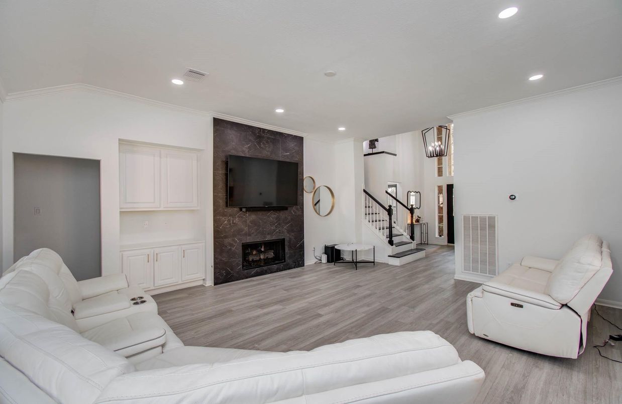 Fireplace, Interior, Living room, Recessed Lighting, Wood Texture Flooring