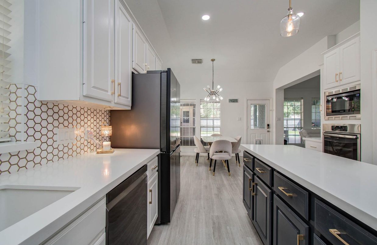 Dining room, Interior, Kitchen, Pendant Lights, Recessed Lighting, Stainless Steel Appliances, Wood Texture Flooring