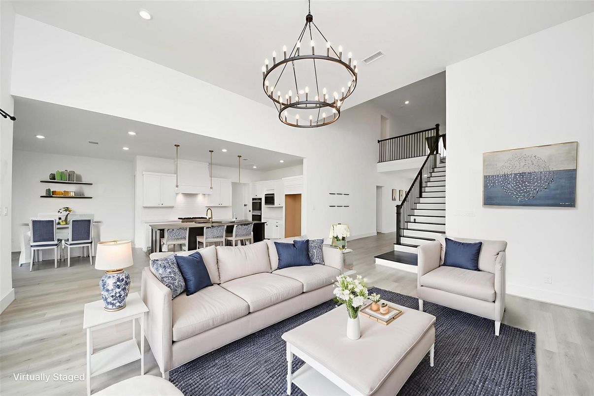 Chandelier, Dining room, Interior, Kitchen, Living room, Pendant Lights, Recessed Lighting, Stainless Steel Appliances, Wood Texture Flooring