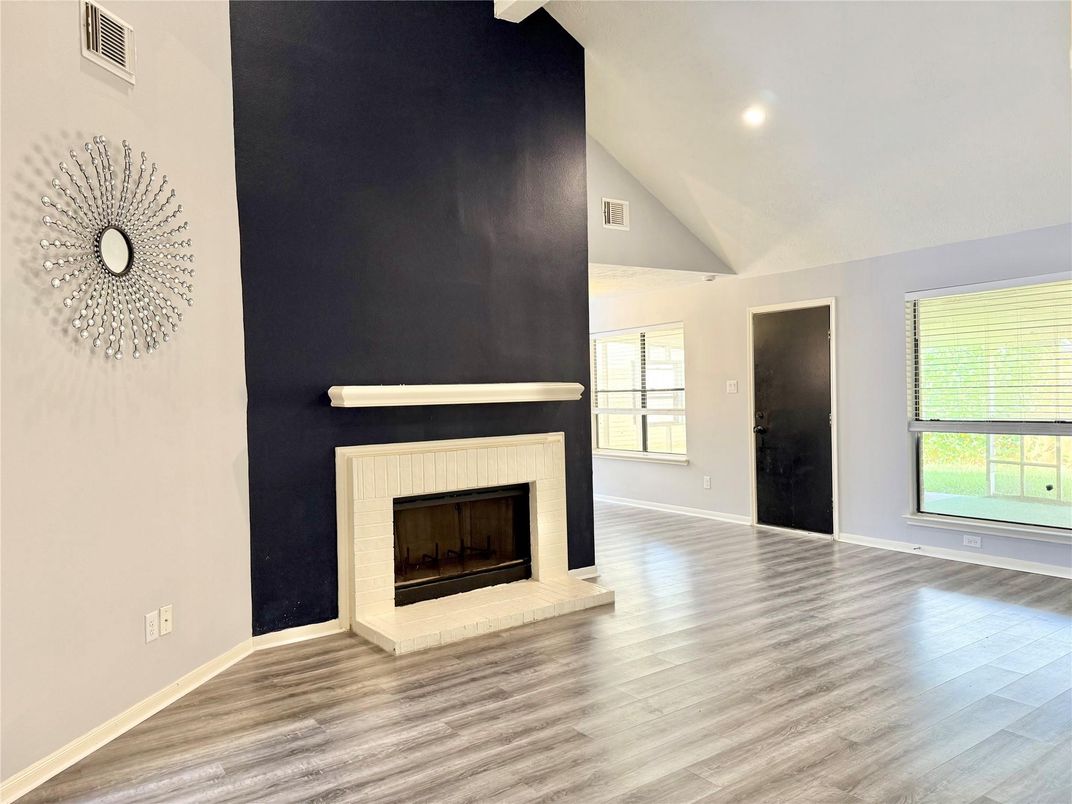 Empty room, Fireplace, Interior, Recessed Lighting, Wood Texture Flooring