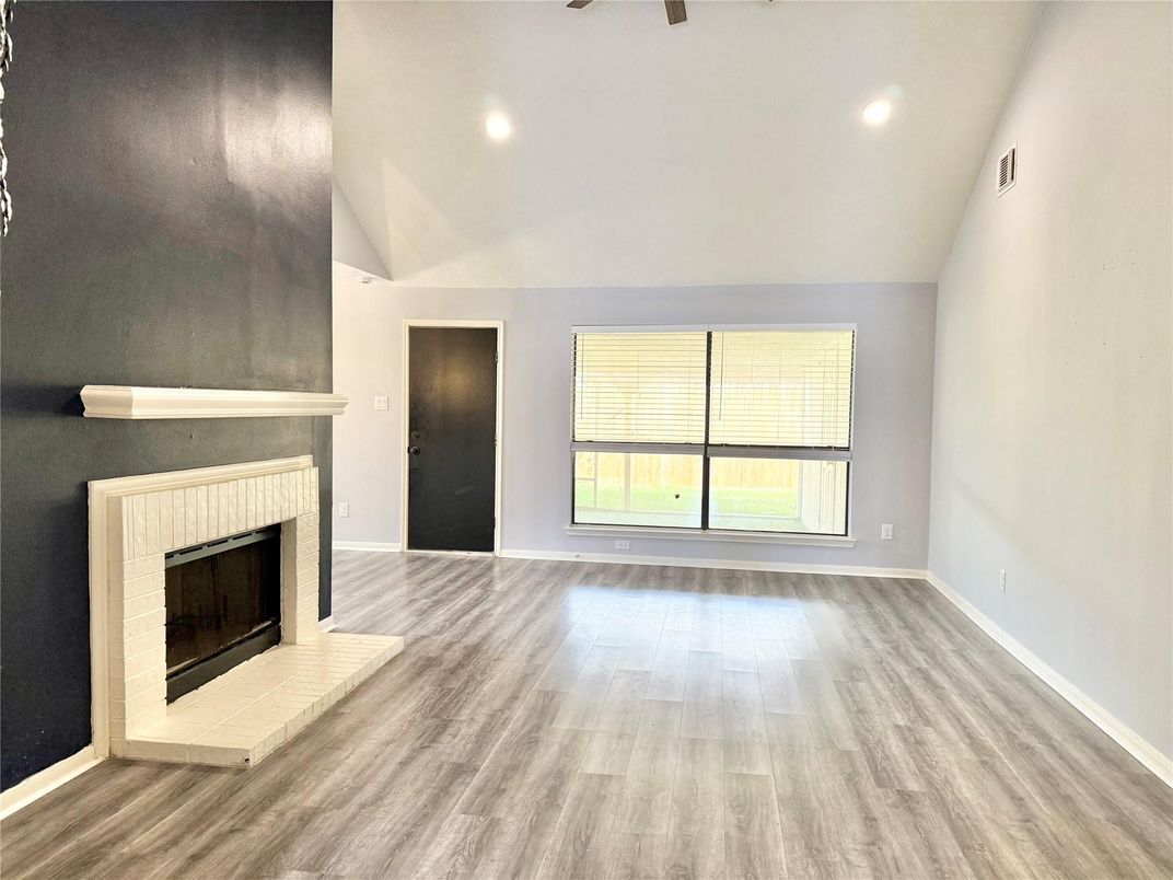 Empty room, Fireplace, Interior, Recessed Lighting, Wood Texture Flooring