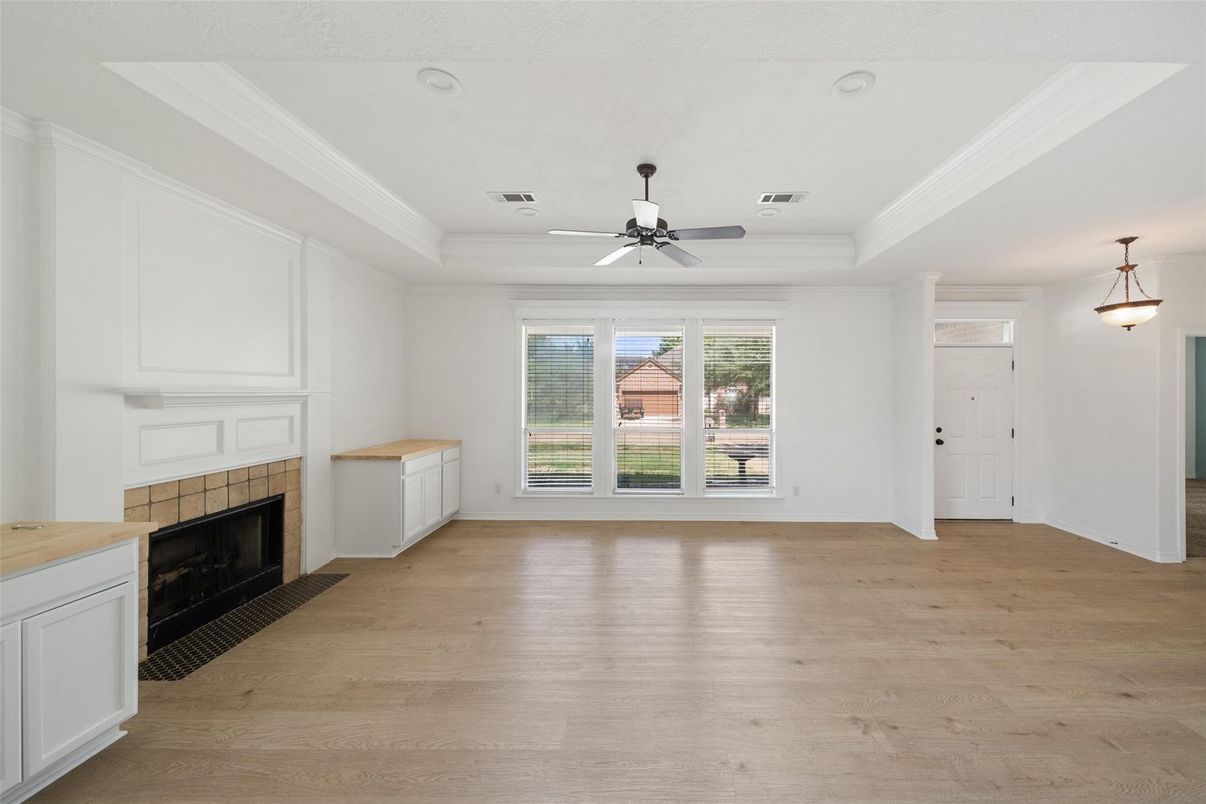 Empty room, Fireplace, Interior, Pendant Lights, Recessed Lighting, Wood Texture Flooring