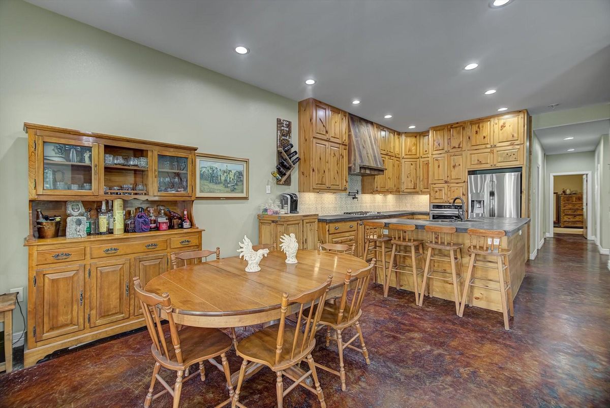 Dining room, Interior, Kitchen, Recessed Lighting, Stainless Steel Appliances, Wood Texture Flooring